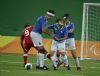 Tres jugadores de la seleccin espaola, tras arrebatar el baln a un jugador mexicano.