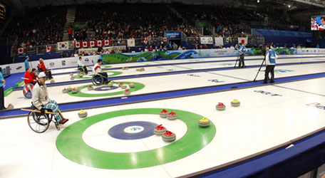 Imagen de curling en silla de ruedas