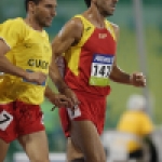 Manuel Garnica, con su guía, en la prueba de 5000 metros T11 del Mundial de Atletismo Doha 2015.