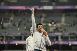 Joan Munar recogiendo su medalla de bronce