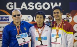 Israel Oliver en Glasgow 2015, medalla de bronce en 100m mariposa s11